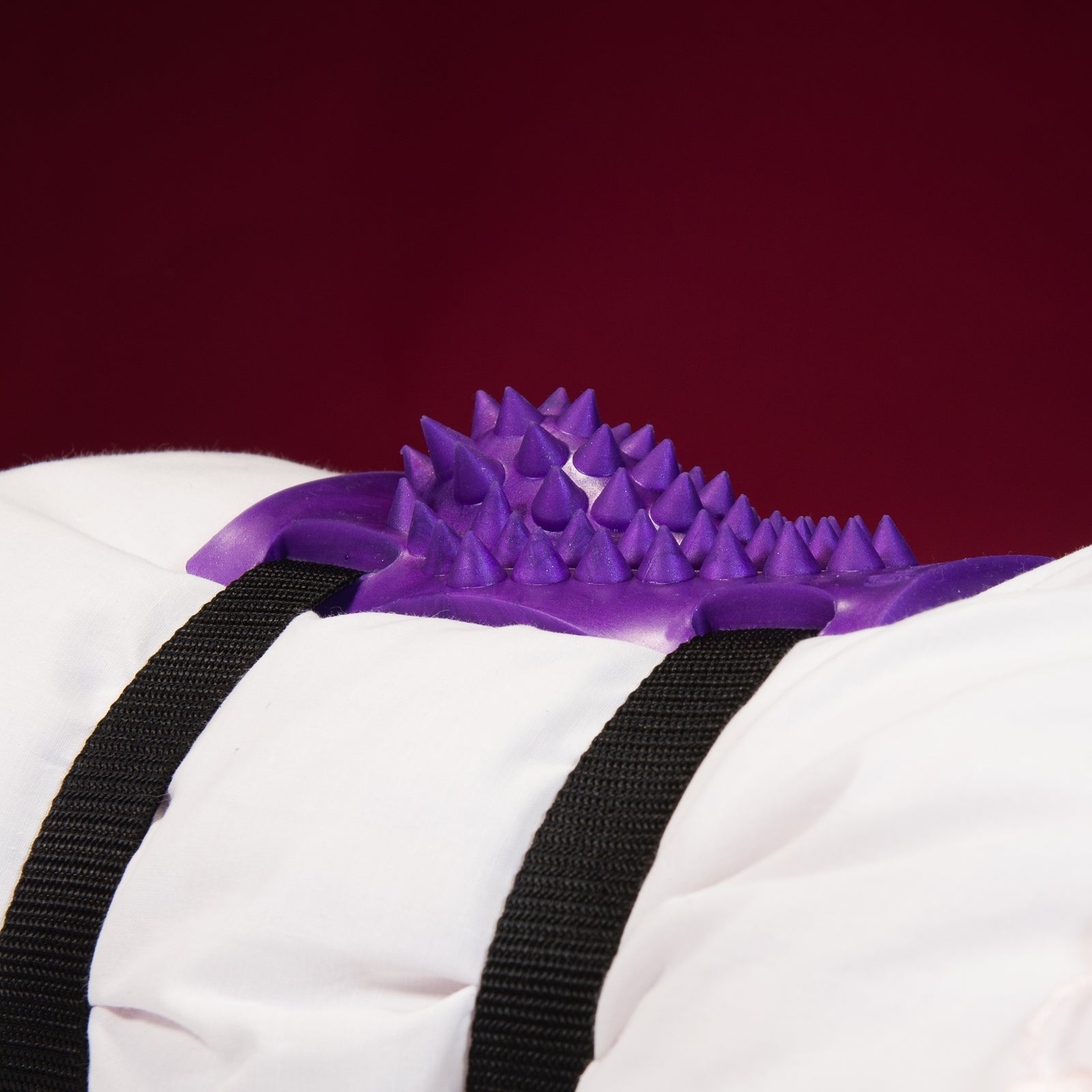 Godemiche Grind Pad on pillow