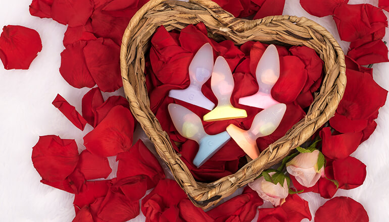 Godemiche Silicone DIldo Plug-B Pastel Hearts Collection on rose petals in a wicker heart shaped basket