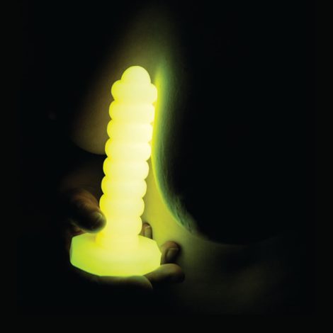 Absolem Yellow Glow in the dark in the hand next to boob (cencsored)