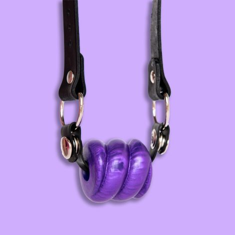 Purple pearl drool gag on lilac background part of Godemiche SIlicone ball gag range