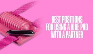 Pink Vibe pad with waves texture, black straps and silver bullet vibe on a pink background next to the words Best Positions for using a Vibe Pad with a partner