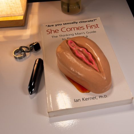 Realistic Palm Grinder On Bedside Cabinet With Book